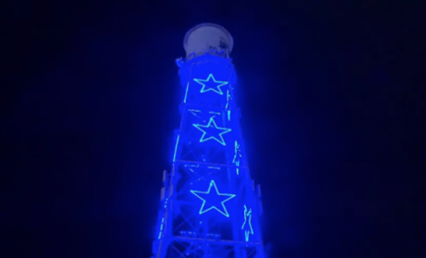 Fresno water tower lights up blue for frontline workers